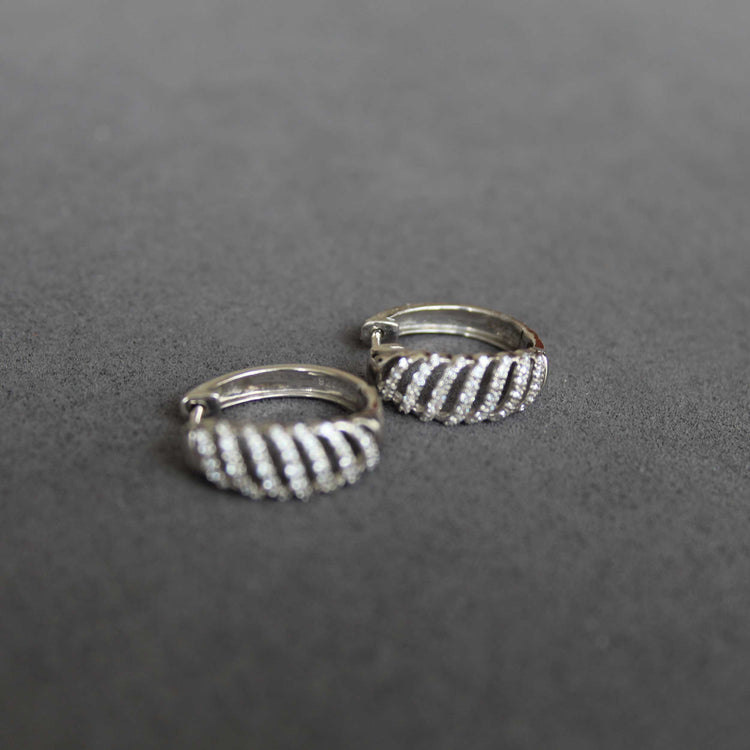 1/3 Cttw Diamond Lace Twist Dome Hoop Earrings set in 925 Sterling Silver