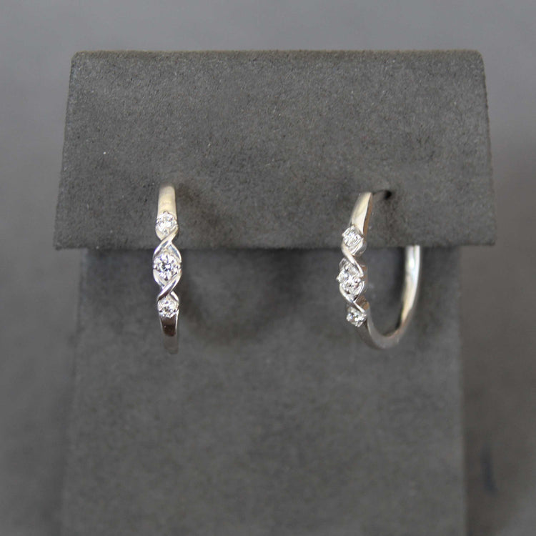 1/4 Cttw Diamond Infinity Oval Hoop Earrings set in 925 Sterling Silver