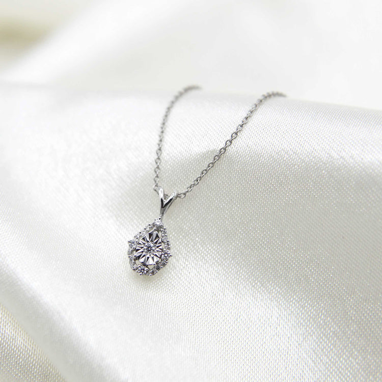 1/10CT TW Diamond Teardrop Pear Cluster Fashion Pendant in Sterling Silver