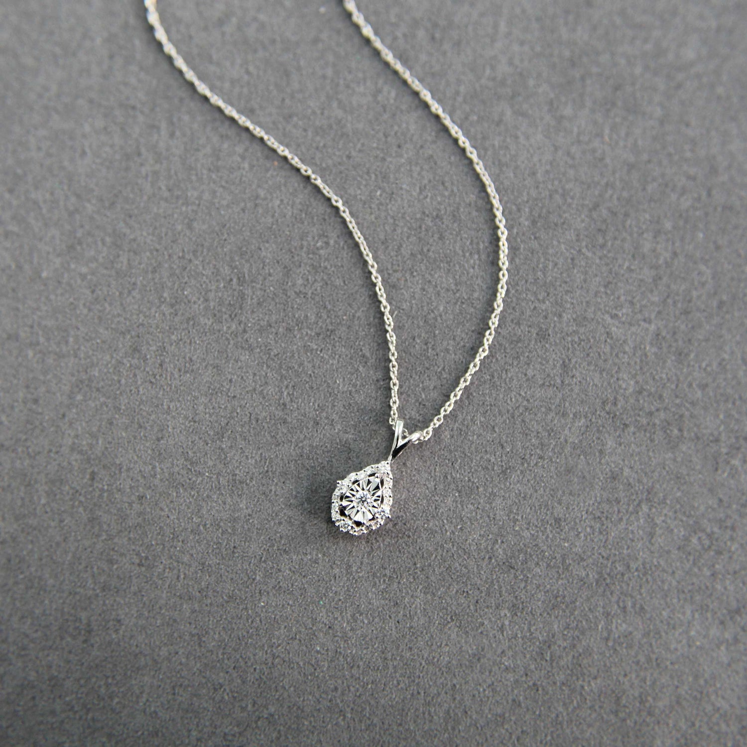 1/10CT TW Diamond Teardrop Pear Cluster Fashion Pendant in Sterling Silver