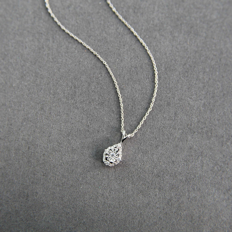 1/10CT TW Diamond Teardrop Pear Cluster Fashion Pendant in Sterling Silver