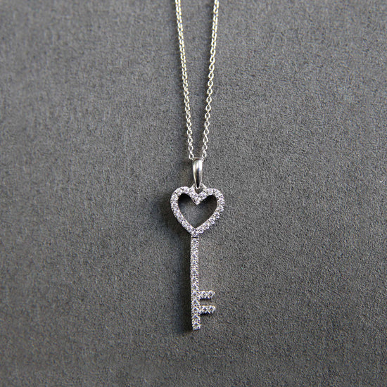 10K White Gold 1/4 Carat TW Round (I2 Clarity) Diamond Key Heart Pendant Necklace