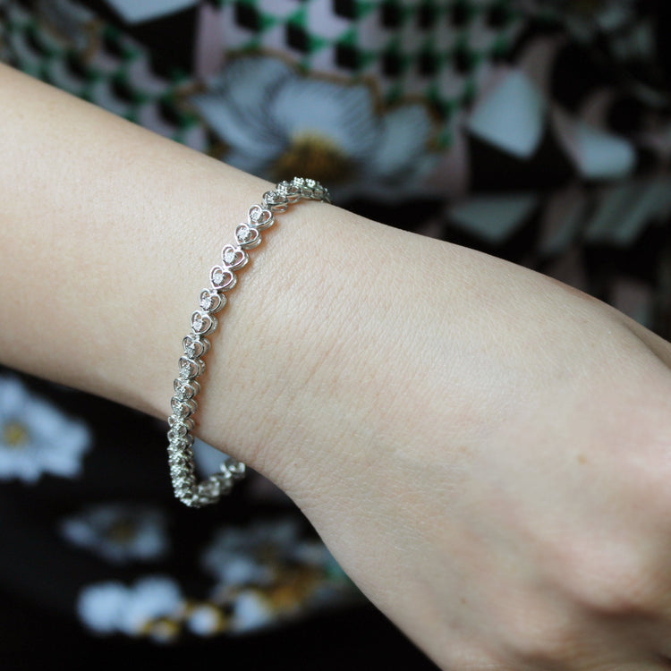 1/8ct tw Diamond Heart Tennis Bracelet in Sterling Silver