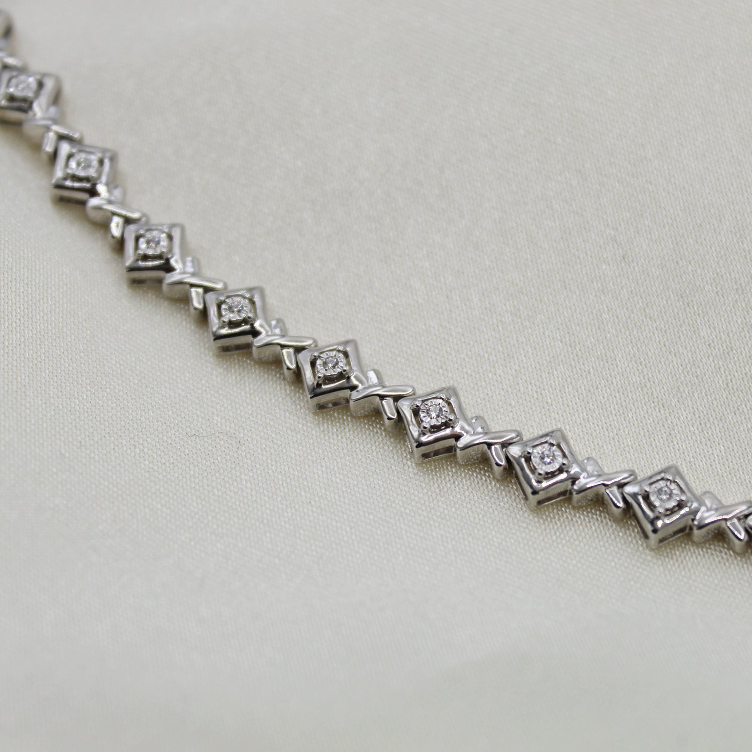 1/6ct tw Diamond XO Tennis Bracelet in Sterling Silver