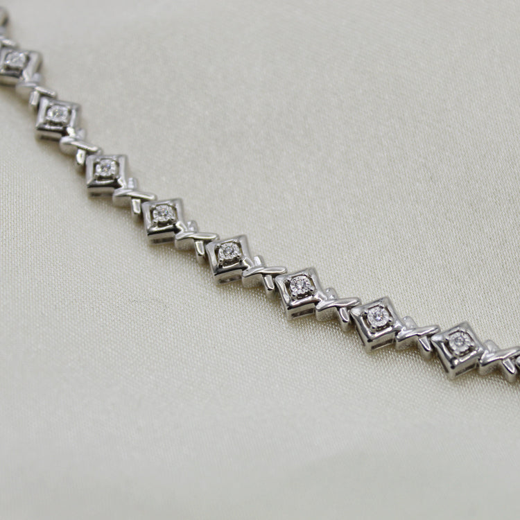 1/6ct tw Diamond XO Tennis Bracelet in Sterling Silver