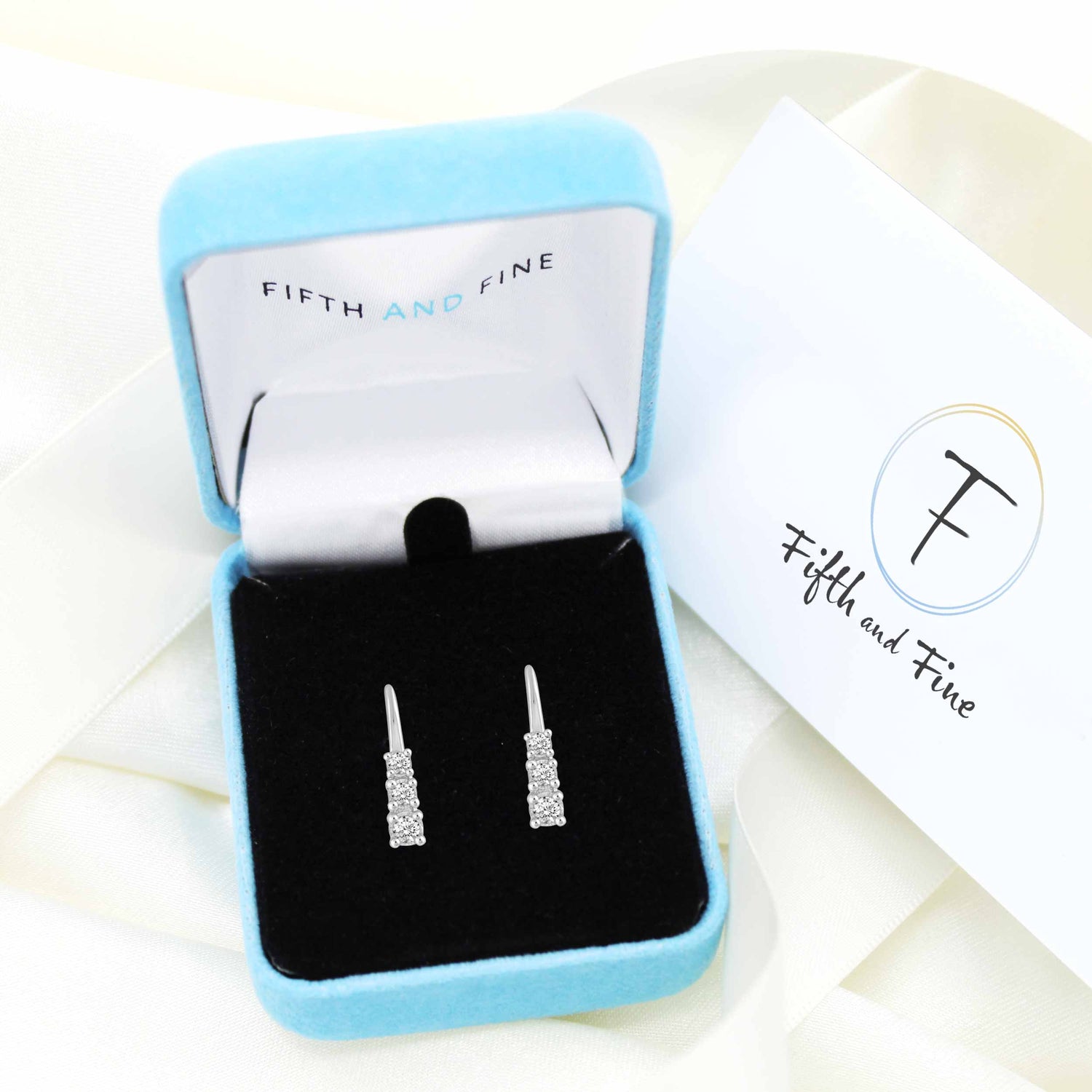 1/4 Cttw Diamond Trilogy Hoop Earrings set in 925 Sterling Silver