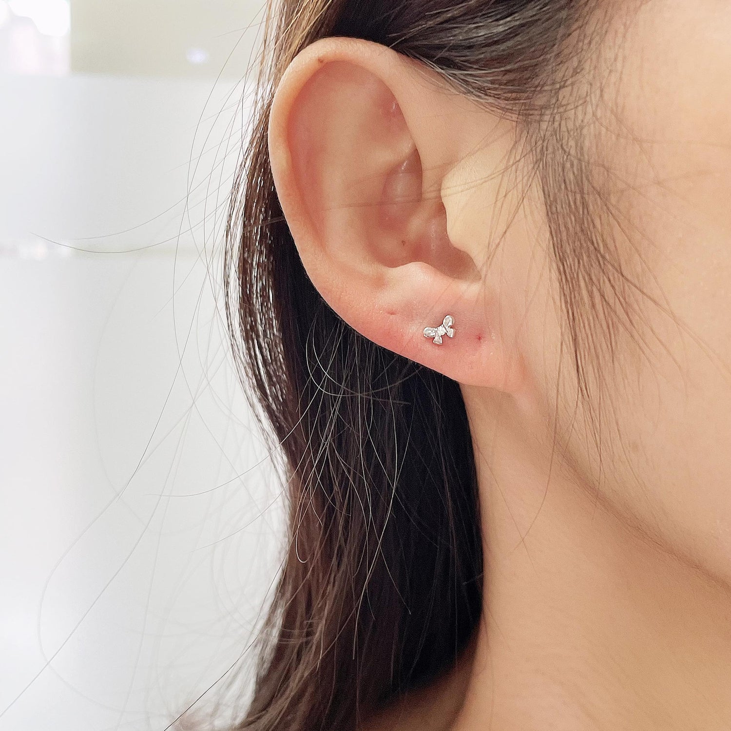 1/60 Cttw Natural Diamond Bow Tie Stud Earrings in 925 Sterling Silver