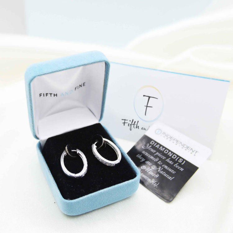1/2 Cttw Diamond Channel Set Oval Hoop Earrings set in 925 Sterling Silver