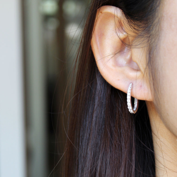1/2 Cttw Diamond Oval Hoop Earrings set in 925 Sterling Silver