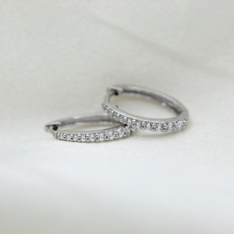 1/2 Cttw Diamond Oval Hoop Earrings set in 925 Sterling Silver