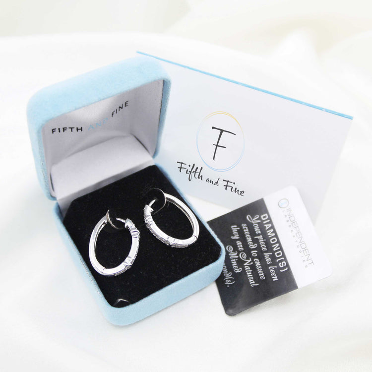 1/2 Cttw Diamond XO Hoop Earrings set in 925 Sterling Silver