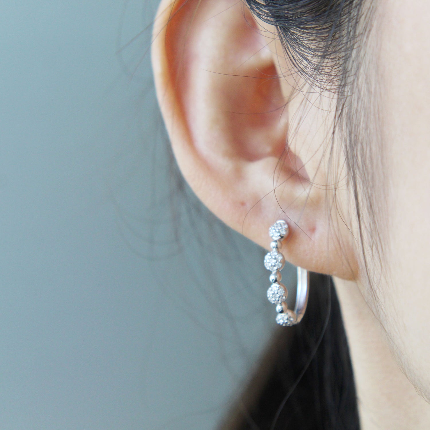 1/2 Cttw Diamond Four Cluster Hoop Earrings set in 925 Sterling Silver