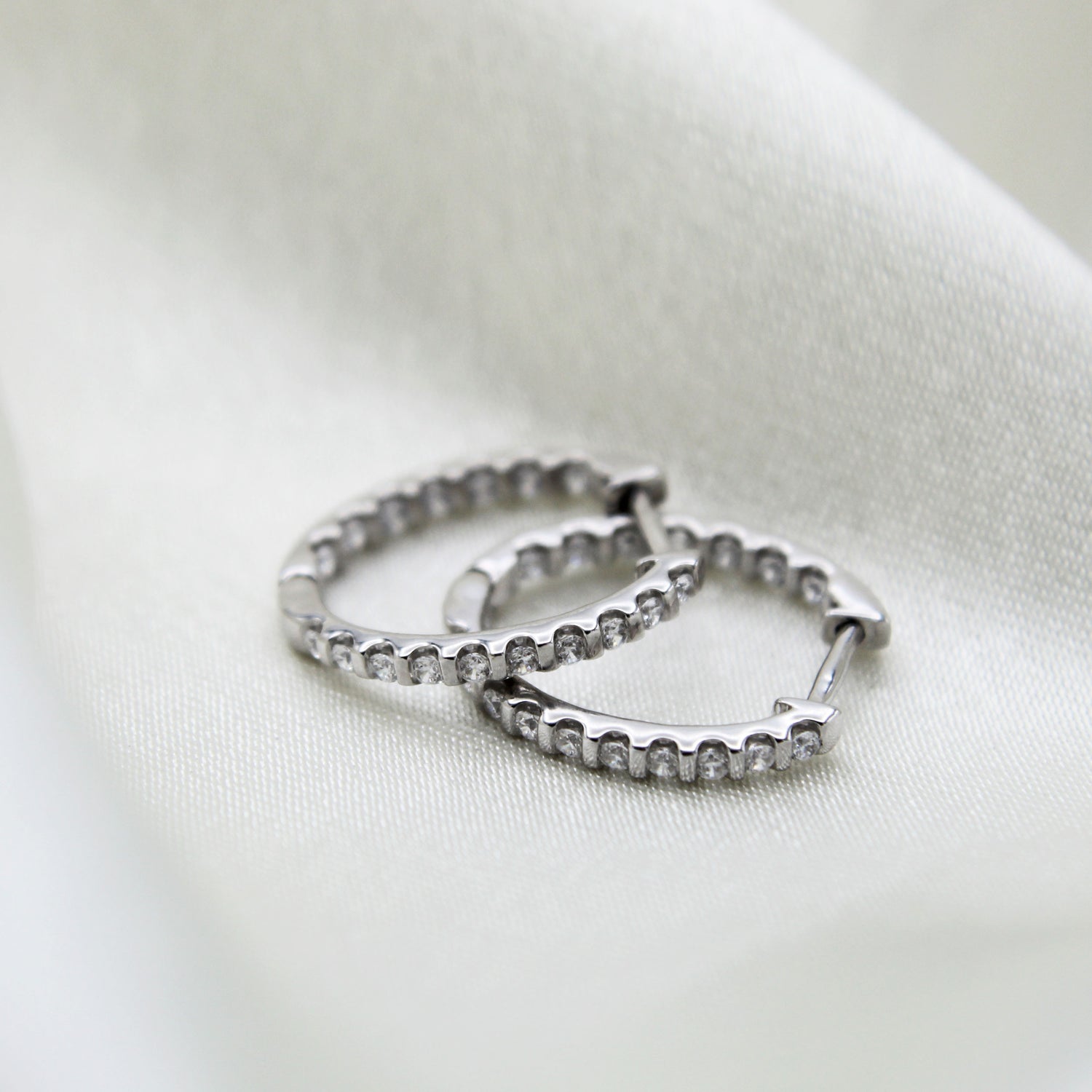 1/2 Cttw Diamond Inside Out Hoop Earrings set in 925 Sterling Silver