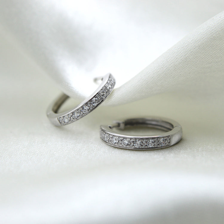 1/2 Cttw Diamond Channel-Set Hoop Earrings set in 925 Sterling Silver