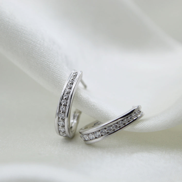 1/4 Cttw Diamond Channel-Set Horse Shore Hoop Earrings set in 925 Sterling Silver