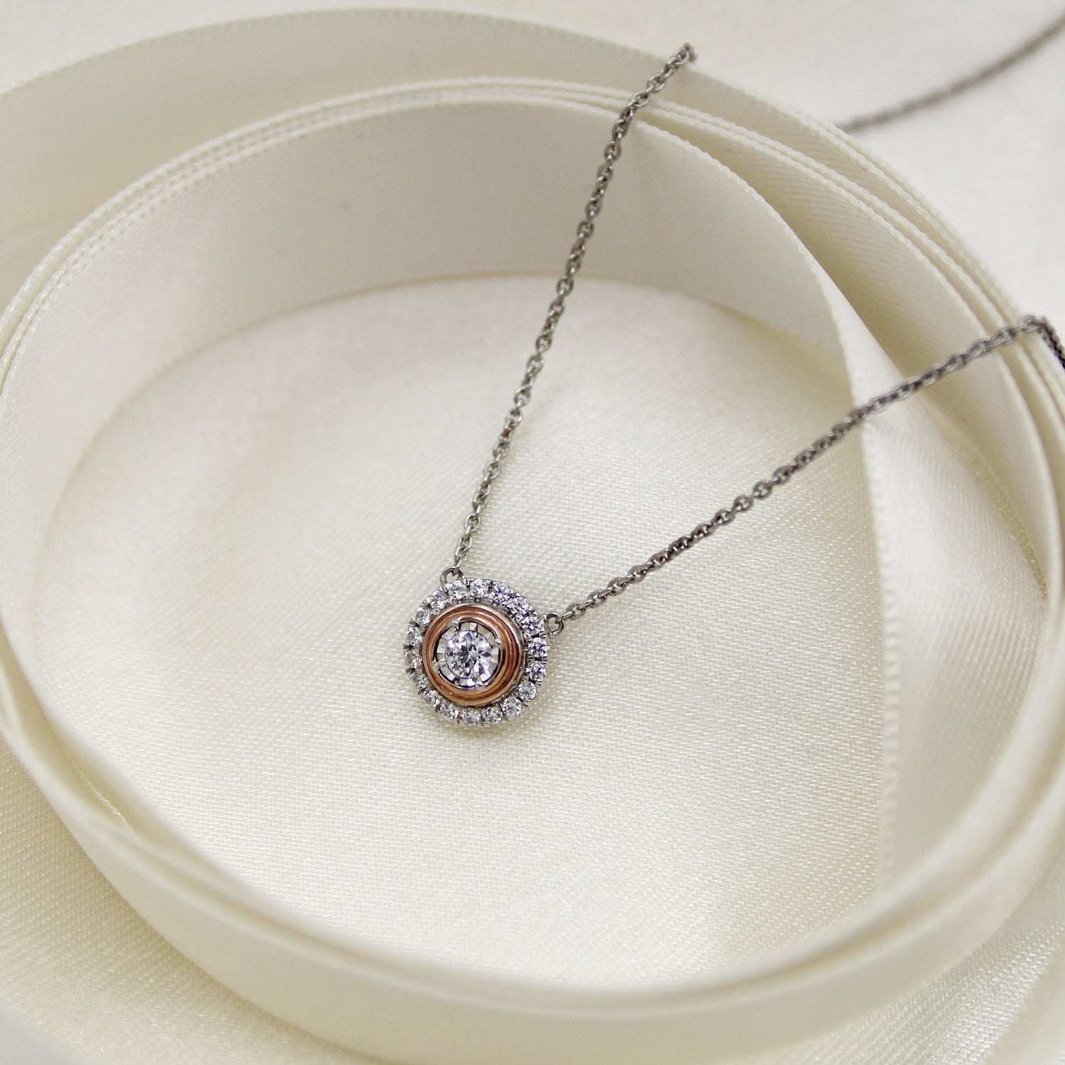 1/4CT TW Diamond Round Halo Necklace in Sterling silver & 10K Rose