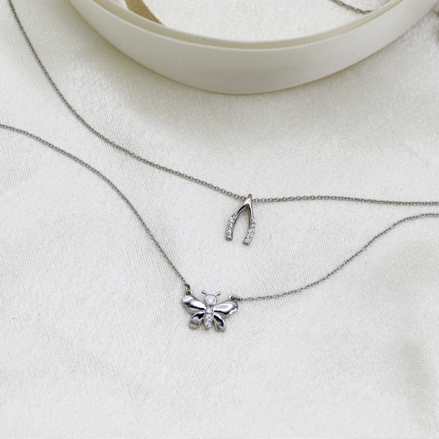 Lucky Wishbone and Butterfly Layered 1/10 Cttw Natural Diamond Pendant Necklace set in 925 Sterling Silver…
