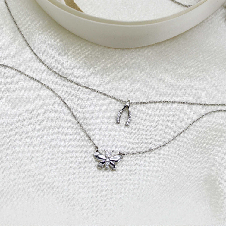 Lucky Wishbone and Butterfly Layered 1/10 Cttw Natural Diamond Pendant Necklace set in 925 Sterling Silver…