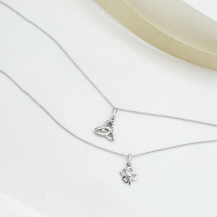 Four Leaf Clover and Celtic Trinity Knot Layered 1/20 Cttw Natural Diamond Pendant Necklace set in 925 Sterling Silver…