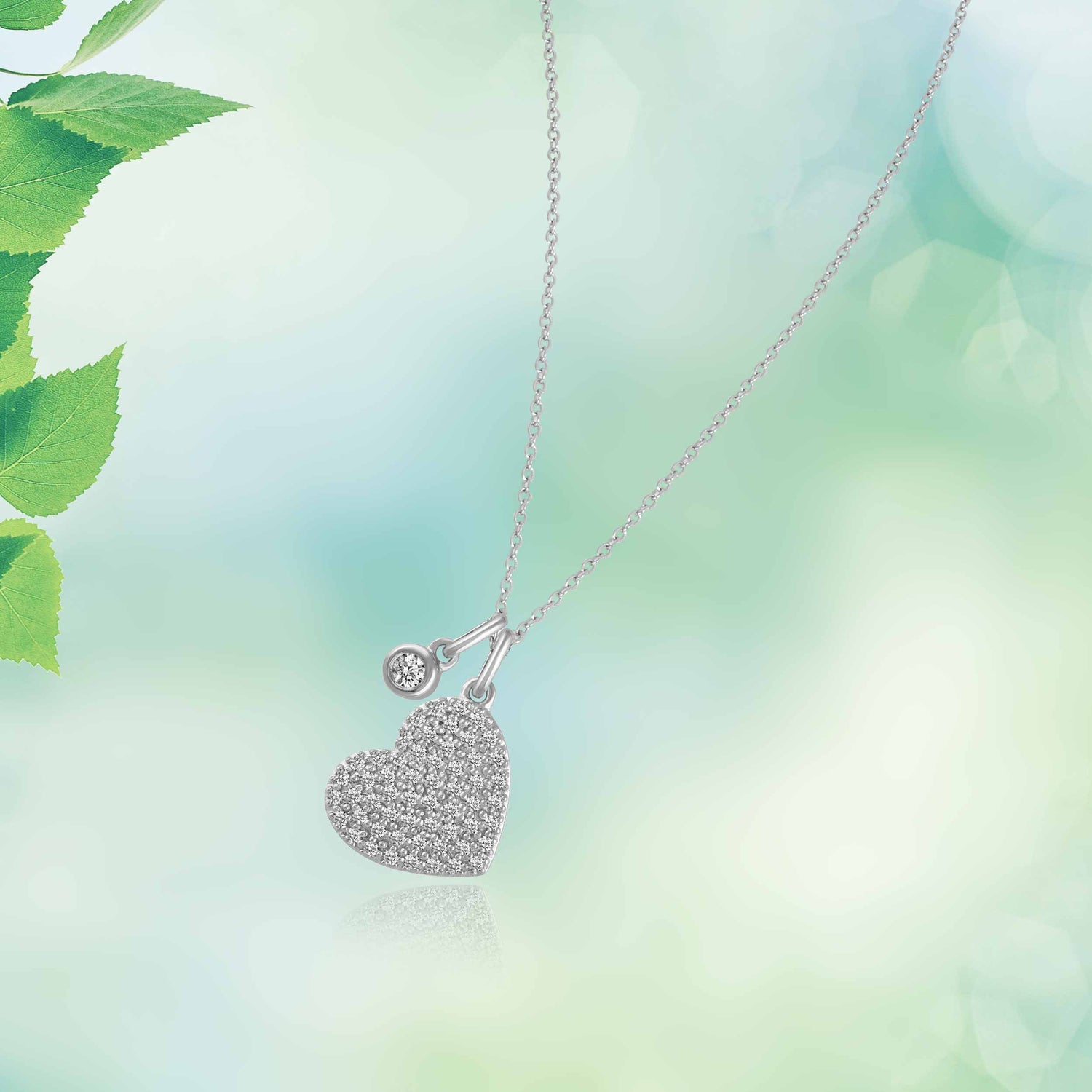 1/20 CT TW Diamond Pave Heart Floating Stone Pendant in 925 Sterling Silver