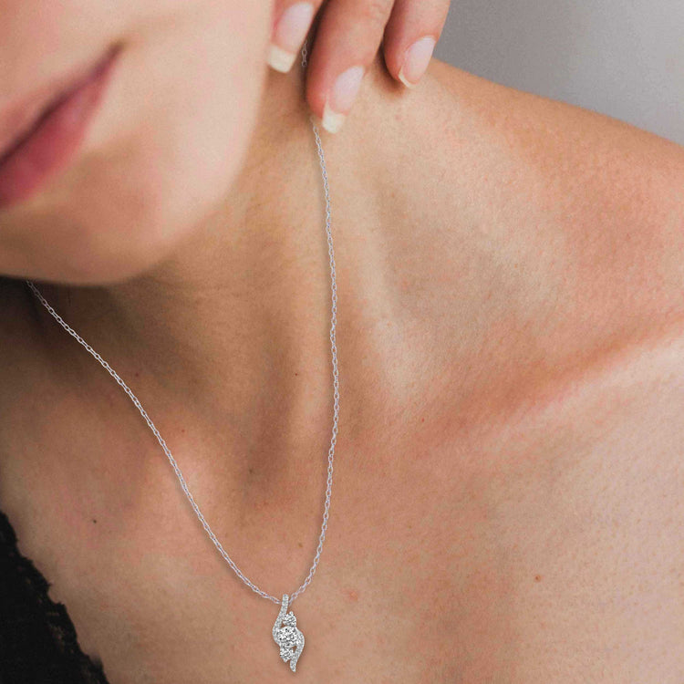 1/2 CTW Diamond Elegant Trilogy Pendant Necklace set in 925 Sterling Silver