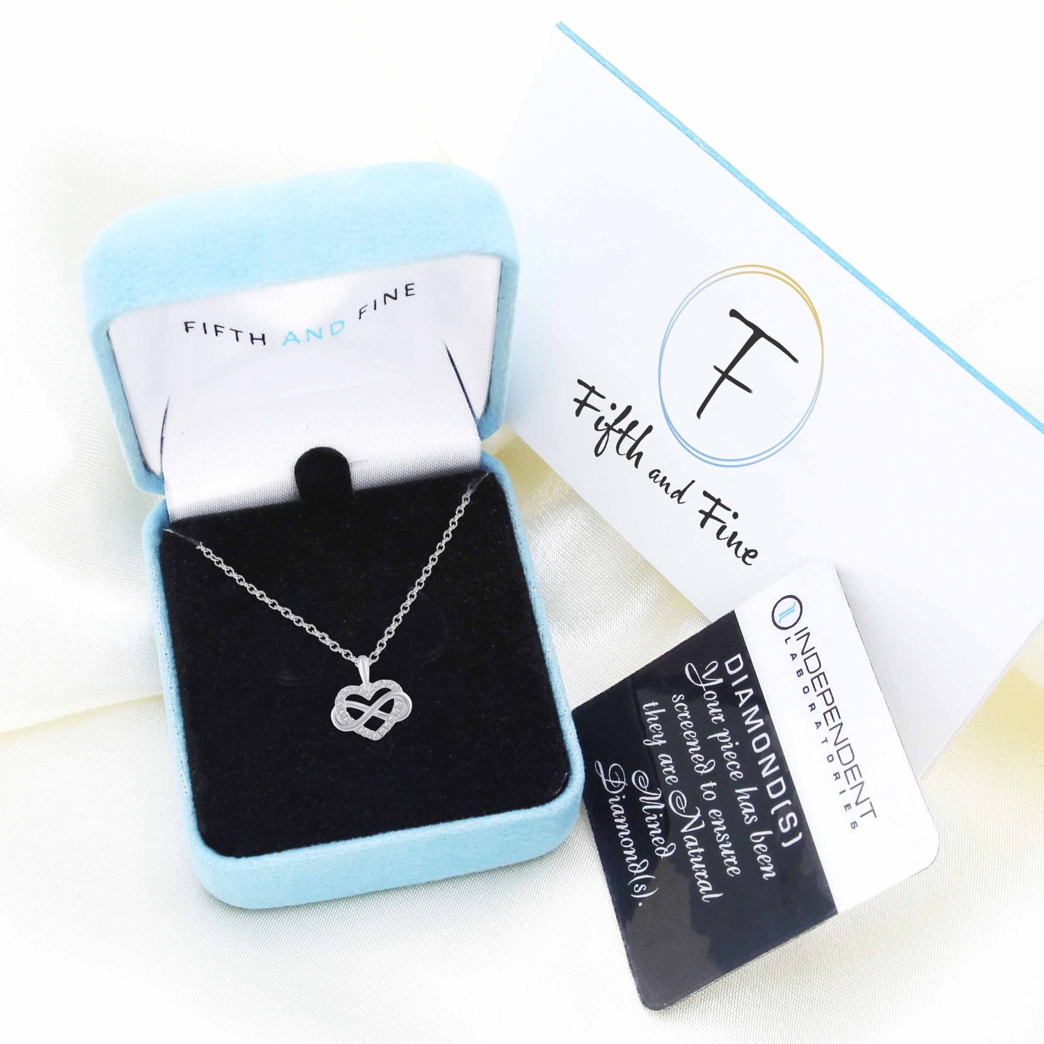 1/6 CT TW Diamond Infinity Heart Love Pendant Necklace in 14K Gold