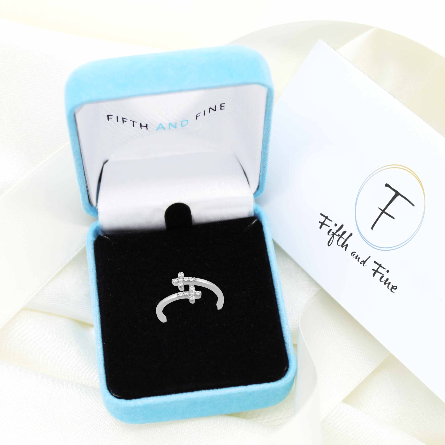 1/6 CT TW Diamond Cross Fashion Ring in Sterling Silver