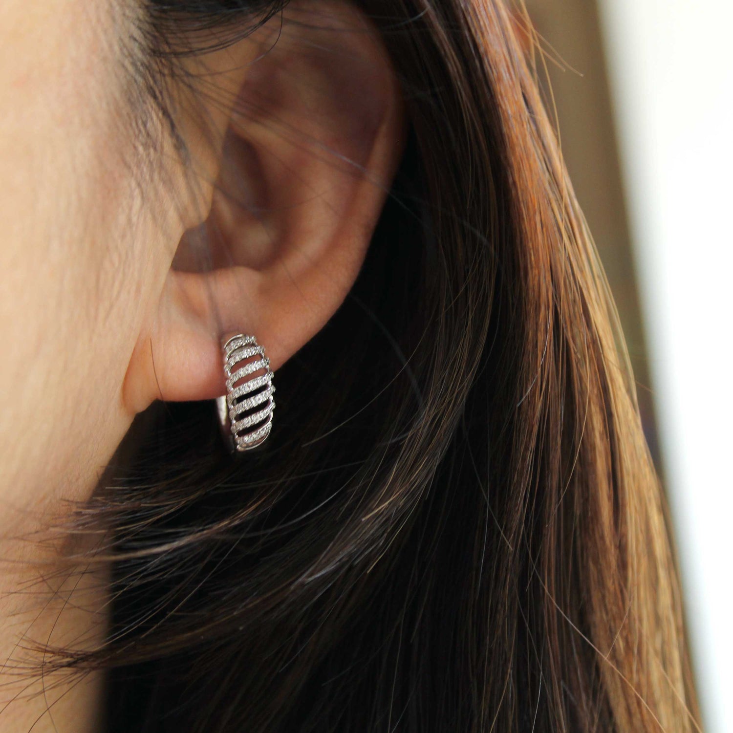 1/3 Cttw Diamond Lace Twist Dome Hoop Earrings set in 925 Sterling Silver