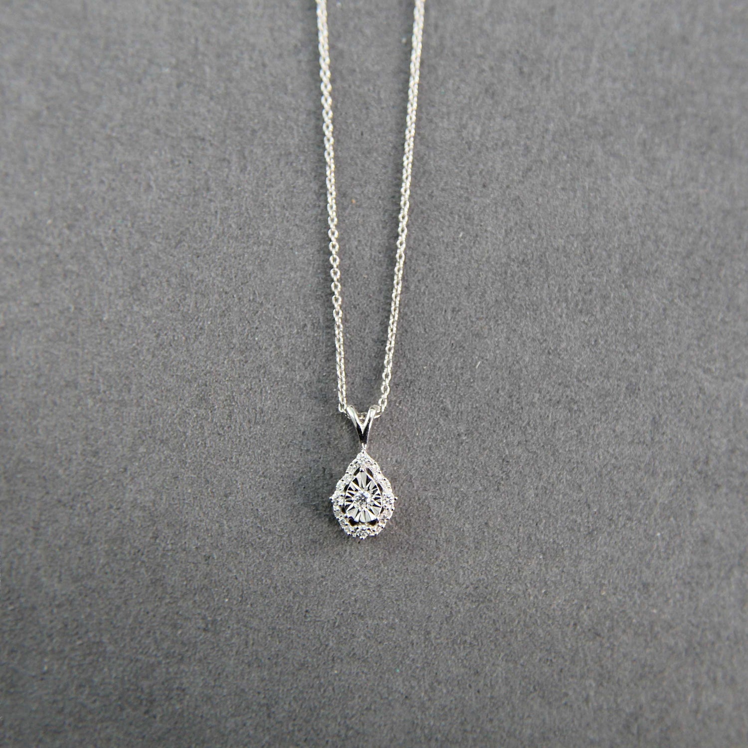 1/10CT TW Diamond Teardrop Pear Cluster Fashion Pendant in Sterling Silver
