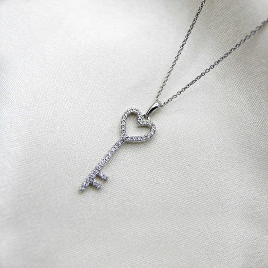 10K White Gold 1/4 Carat TW Round (I2 Clarity) Diamond Key Heart Pendant Necklace