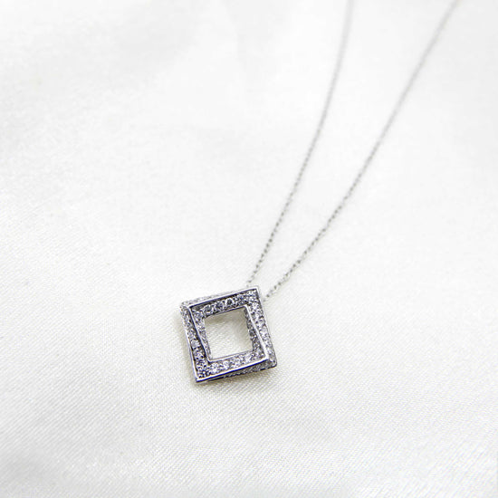 1/2 Cttw Diamond Open Diamond Shape Pave Twisted Pendant Necklace set in 925 Sterling Silver