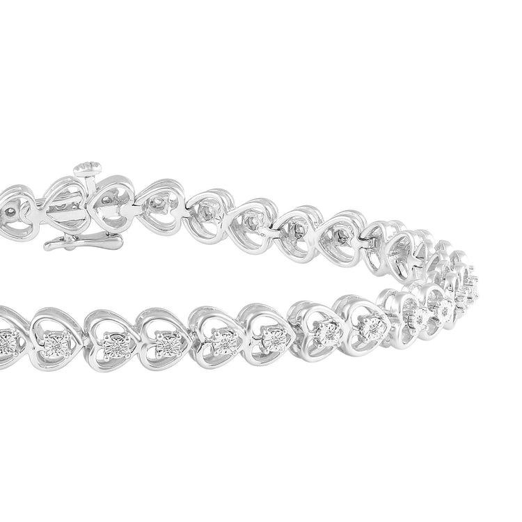 1/5 CT. T.W. Diamond Heart Assorted Charm Bracelet in Sterling Silver