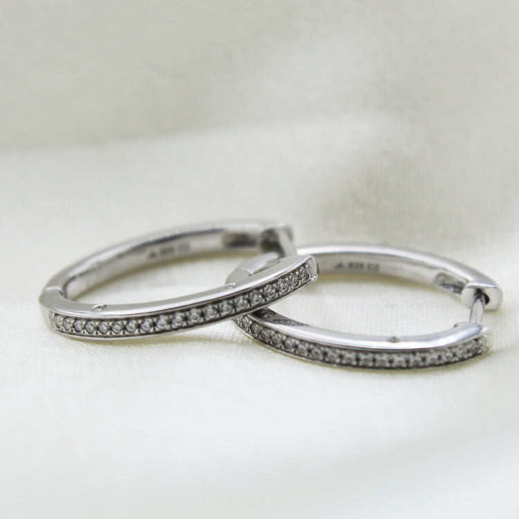 1/4 Cttw Diamond Channel-Set Hoop Earrings set in 925 Sterling Silver