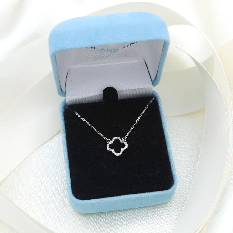 Open Four Leaf Clover 1/20 Cttw Natural Diamond Pendant Necklace set in 925 Sterling Silver