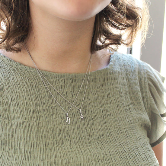 Musical Treble Clef and Eighth Note Layered 1/20 Cttw Natural Diamond Pendant Necklace set in 925 Sterling Silverβ¦