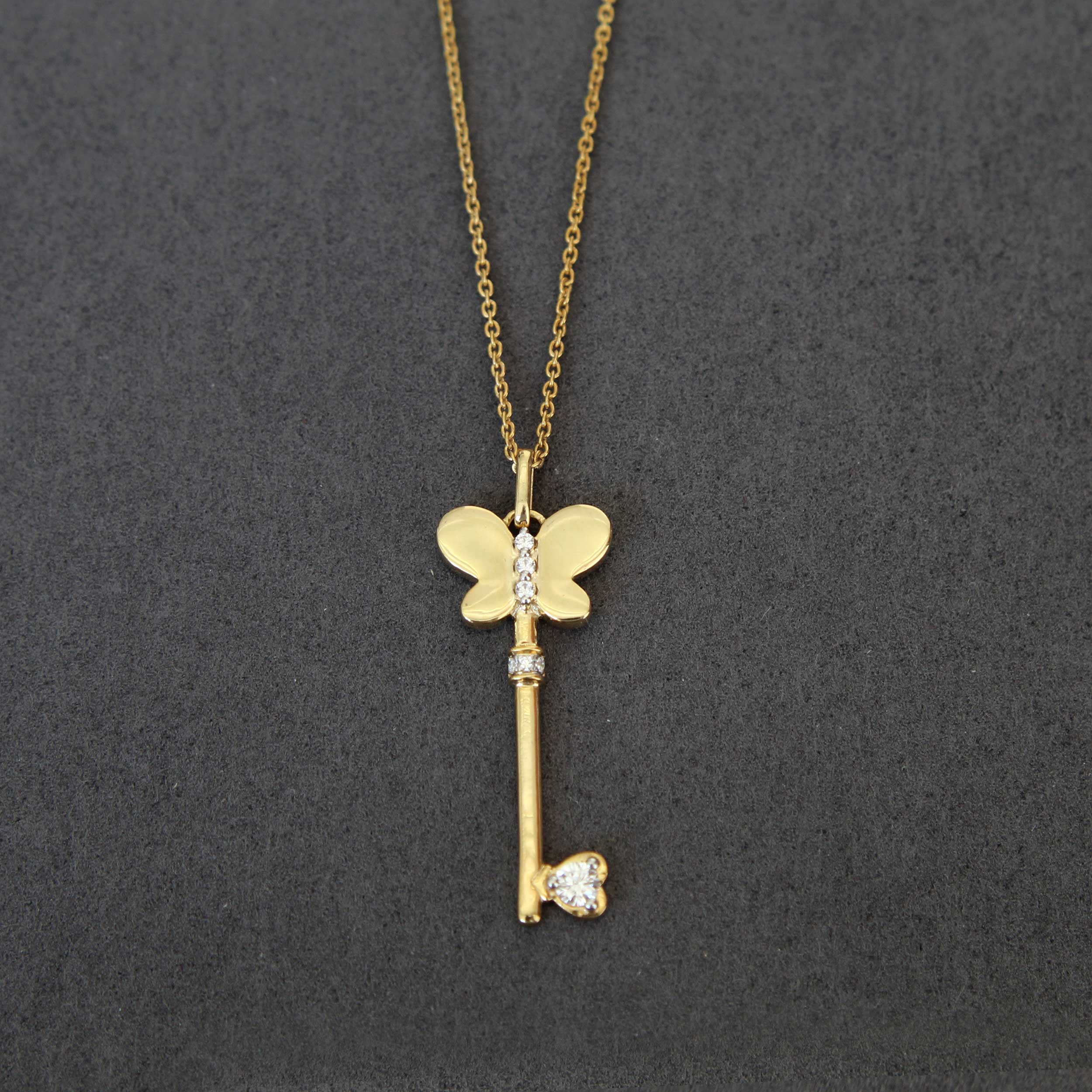 Gold heart and on sale key necklace set